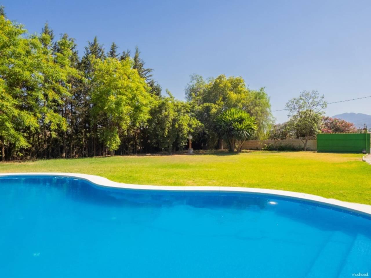 Casa Adosada de 5 Dormitorios en venta en Alhaurin el Grande