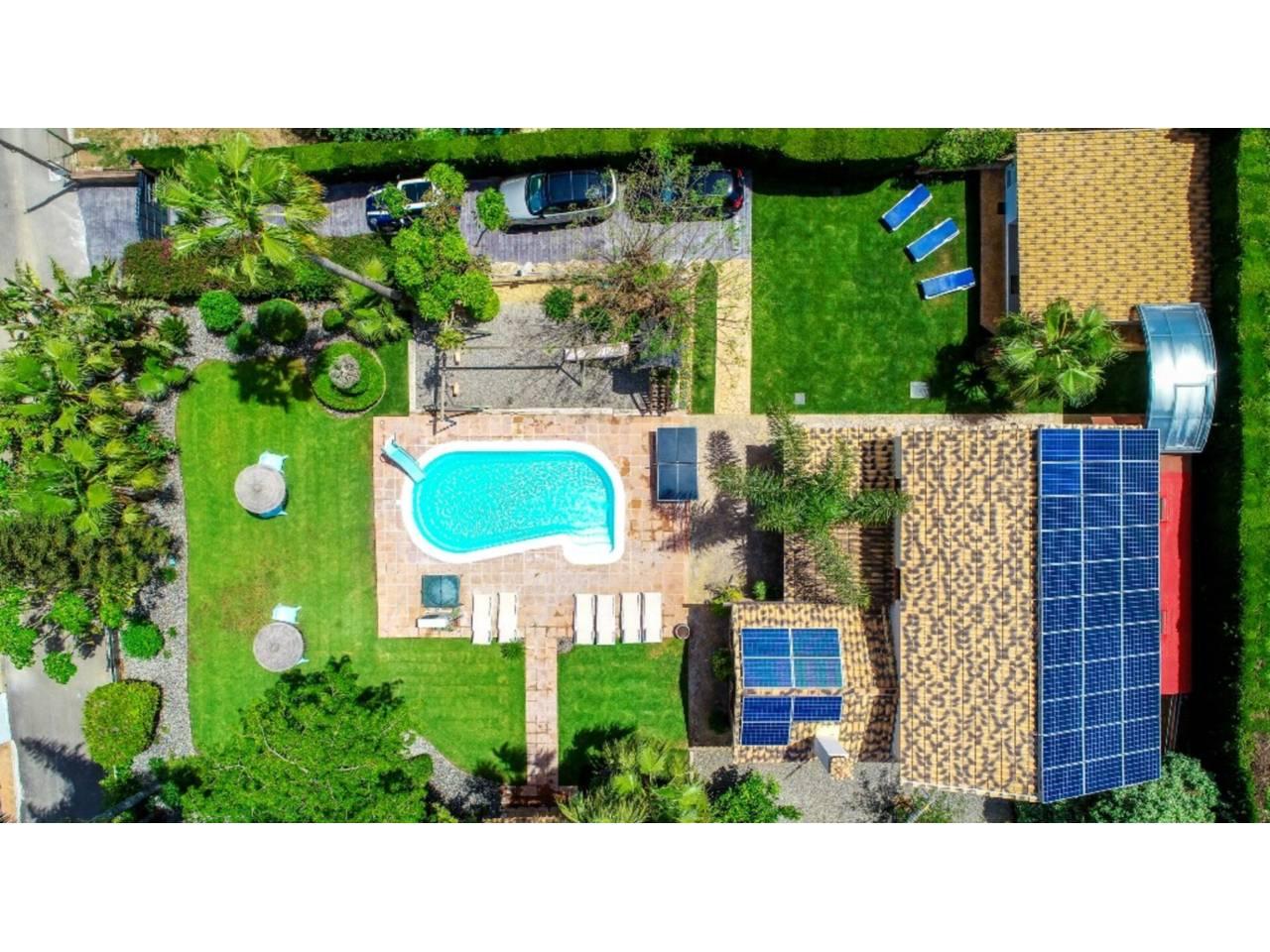 Casa Adosada de 5 Dormitorios y 4 Baños en venta en Málaga